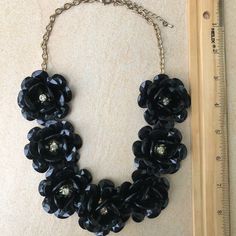 Nwot Flowered Black Necklace With Rhinestone Centers Flower Pendant Necklace With Charm For Parties, Party Flower Pendant Necklace With Flower Charm, Flower Pendant Necklace For Party, Elegant Black Flower Necklace For Party, Black Flower Necklace For Party, Elegant Black Flower Pendant Necklace, Elegant Black Flower Necklaces, Elegant Black Necklace With Flower Charm, Black Metal Flower Jewelry