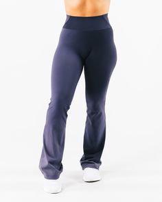 HIGHLIGHTS. Sculpting seamlines Buttery soft hand feel High Stretch Flared leg Sizes XXS - M: 31" inseam Sizes L - XXL: 32.5" inseam FIT SUGGESTION. This item runs true to Alphalete's standard sizing.. We recommend sizing up for a more relaxed fit or down for a more compressive fit.. Model is 5’2”/157.5cm, wearing a size. S. with 39"/99cm hips and 28”/71.1cm waist. MATERIALS AND WASHING DIRECTIONS. 75%. Nylon,. 25%. Spandex. We recommend washing inside-out on a cold setting. Hang to dry DESCRIPT Outfit Aesthetics, Hip Hip, Ombre Effect, Flared Pants, Womens Bras, Bottom Clothes, Soft Hand, Flare Pants, Bottoms Pants