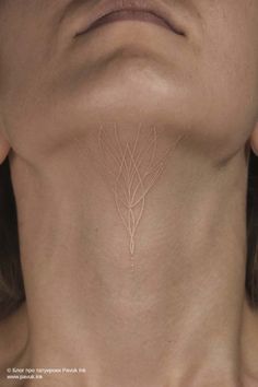 a woman's neck is shown with lines drawn on it