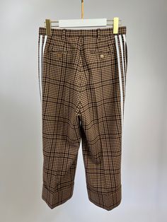 Gucci X Adidas Brown Check Wool Trousers with White Stripe Side Detail Size IT 42 (UK 10)  This garment is in excellent condition Please see the photos for more information on this item Brand - Gucci Colour - Brown Materials - 100% Wool Size conversion – IT 42, FR 38, UK 10 Reference - 029719  We are not affiliated with any of the brands that we sell. Please note that all of our items are and sold on behalf of private individual sellers. Purchasing through us is contributing to an ethical and sustainable fashion future. All our items come with an. All sales are final. You are aloraing great choices for the planet and for yourself, Love Sellier. Gucci X Adidas, Adidas Brown, Fashion Future, Wool Trousers, Chic Me, Casual Backpack, Exclusive Bag, Sustainable Fashion, Sleek Design