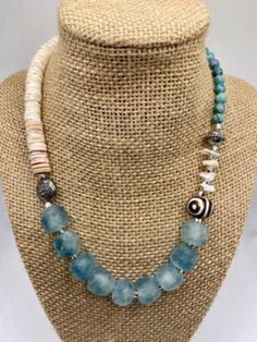 Necklace made with recycled light blue sea glass, coconut disks, silver spacers, brown beads, and mother of pearl shell pieces. Blue Sea Glass Necklace, J Necklace, Beachy Jewelry, Sea Jewelry, Chunky Bead Necklaces, Glass Beads Jewelry, Blue Sea Glass, Beaded Jewelry Designs, Sea Glass Necklace