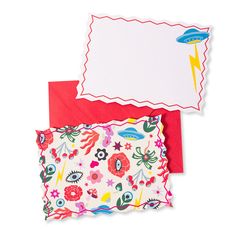 two envelopes with different designs on them, one is red and the other is white