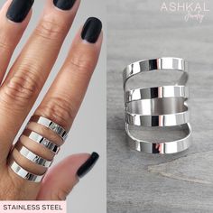 Our High Quality Stainless Steel Rings are sturdy, tarnish-free and made to last a lifetime. All our products are made by us with great care. Made in the USA with globally sourced high quality materials. Thoughtfully packaged with recyclable and biodegradable materials. This wide + edgy statement ring features 4 stripes that taper down to the back of the ring, making it very comfortable regardless of its length. Choose from 2 finishes: satin / mirror. DIMENSIONS:  3 cm (1.2") front (measuring fr Trendy Open Ring In Stainless Steel, Trendy Stainless Steel Open Ring, Modern Stainless Steel Open Midi Rings, Modern Adjustable Stainless Steel Stackable Rings, Modern Metal Stackable Rings With Open Ring Shape, Modern Metal Stackable Open Rings, Edgy Rings, Biodegradable Materials, Long Ring