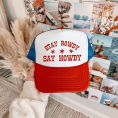 🤠Embrace your wild side with the "Stay Rowdy, Say Howdy" Trucker Hat. Perfect for anyone who loves a bit of mischief with their manners, this hat captures the essence of playful rebellion. With its striking red and white design and bold statement, it's more than just a fashion accessory--it's a lifestyle. Perfect hat for your country concert, night out in Nashville or your local ho down! 🌵Bold Statement: The "Stay Rowdy, Say Howdy" text and vibrant star detailing make this cap a standout piece Trucker Hat Country, Concert Hat, Cool Streetwear, Streetwear Accessories, Country Concerts, Country Concert, Snapback Cap, White Design, Manners