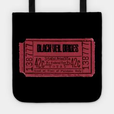 a black tote bag with an old movie ticket on the front and back side