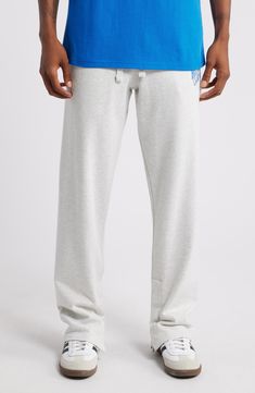 Lift off into another world of comfort in these lounge-ready sweatpants made from a breathable cotton blend with modern branding orbiting the left leg. 33" inseam; 14" leg opening; 16" front rise; 16" back rise (size Medium) Elastic/drawstring waist Front slant pockets 80% cotton, 20% polyester Hand wash, dry flat Imported Black Owned/Founded Athleisure Joggers With Logo Detail For Loungewear, Casual Joggers With Logo Detail For Loungewear, Casual Joggers With Logo For Loungewear, Relaxed Fit Joggers With Logo For Loungewear, Athleisure Sweatpants With Logo For Loungewear, Athleisure Cotton Bottoms With Logo Detail, Casual Loungewear Pants With Logo Detail, Cotton Sportswear Bottoms With Logo Detail, Cotton Sweatpants For Lounging