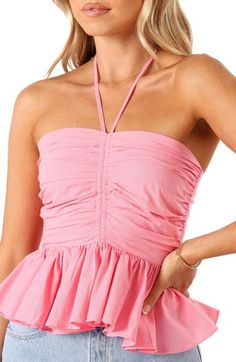 A ruched bodice and shirred back panel create a figure-hugging fit in this playful peplum top outfitted with an adjustable halter neck. Hidden back zip; keyhole with hook-and-eye closure; neck ties Halter neck 100% cotton Hand wash, line dry Imported Pink Peplum Top Outfit, Pink Summer Tops, Pink Going Out Top, Satin Dresses Long, Satin Dresses Long Sleeve, Ribbed Halter Top, Black Tie Wedding Guests, White Dress Shoes, Target Clothes