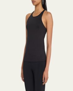 Alo Yoga "Select" active tank in solid stretch knit. Halter neckline. Sleeveless. Racerback. Fitted. Pullover style. Polyester/spandex. Imported. Racerback Tank Top With Built-in Bra And 4-way Stretch, Elastane Tops For Light Exercise And Athleisure, Stretch Racerback Tank Top For Sports, Sports Stretch Racerback Tank Top, Sporty Seamless T-back Tank Top, High Stretch Racerback Tank Top For Training, Seamless Stretch T-back Activewear, Versatile Stretch Activewear With Racerback, Sporty Tank Top With Medium Support And T-back