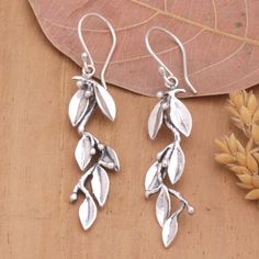 Leaves are symbols of fertility, hope and abundance. Their presence in a design is always reminiscent of nature, like these sterling silver dangle earrings handcrafted in Bali. Presented by Putu Putri, this leafy accessory features a combination finish that allows it to complement any style. Sterling Silver Leaf Earrings With Ear Wire, Nickel Free Leaf-shaped Sterling Silver Jewelry, Hypoallergenic Sterling Silver Leaf-shaped Earrings, Nickel Free Leaf-shaped Sterling Silver Earrings, Sterling Silver Leaf-shaped Jewelry With Ear Wire, Sterling Silver Leaf-shaped Earrings, Nickel Free Sterling Silver Leaf-shaped Earrings, Nickel-free Sterling Silver Leaf-shaped Earrings, Nature-inspired Leaf-shaped Jewelry With Matching Earrings