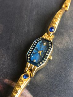 Chinese Shanghai Vintage Quartz Watch for women The sapphire blue dial echoes the blue rhinestones on the bracelet, a very unique design, small and exquisite Baoshihua is a brand from a Shanghai watch factory in the 70s-90s. Before the 1990s, the watches existing in Shanghai Watch Factory were all manual mechanical watches, but in the subsequent development of internationalization, the quartz watch movement was slowly introduced, and then the Japanese quartz watch movement was slowly used, such as this watch This is a never-before-worn vintage watch in very good condition. New battery is fitted, and working perfectly. Length:18.3cm Width: 12cm (crown excluded) Enjoy your shopping! Vintage Shanghai, Chinese Vintage, Small Watch, Watch For Women, Watches Unique, Jewelry Lookbook, Funky Jewelry, Women Wrist Watch, Sapphire Blue