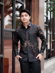 Origin: 🇮🇩 *Indonesia* Design: 🎨 *Batik* Material: ✨ *Japanese Satin Cotton* *Description:*   This batik shirt seamlessly combines luxury and comfort in one design. Wear it with pride and showcase the charm of Indonesian culture in your style. Perfect for formal events, business meetings, or daily wear. *Model Size:*   📏 *Height:* 175 cm   ⚖️ *Weight:* 75 kg   📐 *Size:* L *Product Specifications:* - *Primary Color:* Dominantly Black with Yellow and Gray accents - *Main Fabric:* Japanese Sat Black Long Sleeve Shirt With Batik Print, Black Long Sleeve Batik Print Shirt, Traditional Black Shirt With Batik Print, Traditional Black Printed Shirt, Casual Black Shirt With Batik Print, Outfit Cowok, Style Batik, Design Batik, Indonesian Culture