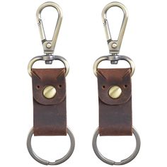 two leather key fobrings with metal rings on each side and an oval ring at the end