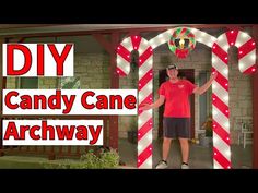 a man standing in front of a candy cane arch with the words diy on it