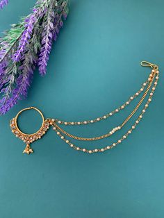 About 1.25 inch in diameter. Clear silver and chain. Gold-tone Alloy Chain Jewelry, Adjustable Alloy Chain Jewelry, Gold Hoop Alloy Jewelry, Gold Hoop Jewelry In Alloy, Gold Hoop Jewelry Made Of Alloy, Gold Alloy Ring, Gold Alloy Ring Jewelry, Gold Chain Alloy Jewelry As Gift, Rose Gold Alloy Chain Jewelry