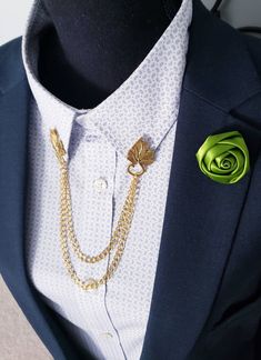 Looking for a unique and stylish accessory that can elevate your look and make you stand out from the crowd? Add a touch of nature and elegance to your outfit with this Elegant Leaf Collar Pin! It features a realistic leaf design that is made of high-quality alloy and steel. The leaf is attached to two gold chains that can be clipped onto your collar, lapel, blouse, or any other clothing item. This Elegant Leaf Collar Pin is completely customizable, so you can choose the length of the chains, th Elegant Leaf-shaped Jewelry For Formal Occasions, Elegant Leaf-shaped Formal Jewelry, Elegant Leaf-shaped Jewelry For Party, Elegant Leaf-shaped Party Jewelry, Sunflower Accessories, Chain Shirt, Shirt Clips, Formal Clothing, Collar Pin