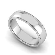 a white gold wedding ring on a white background