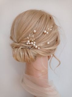 This pearl bridal wedding hair pins are perfect for a bling wedding theme. Gorgeous wedding hair clip with shining crystals and beautiful pearls. It looks beautiful and attractive. You will love it.  Available: SILVER, GOLD with white or ivory pearls       SET of 6  or SET of 12      Please read my policies before purchase: https://www.etsy.com/shop/SilkPearlDesign#policies Bling Wedding Theme, Hair Accessories For Wedding, Pearl Hair Accessories, Wedding Hairstyles And Makeup, Accessories For Wedding, Wedding Hair Up, Bridal Wedding Hair, Hair Accessories Pearl, Bling Wedding