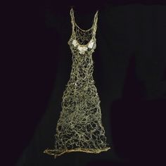 Woven wire dress with cast glass components. Accented with resin and metal powders. 43" x 22" x 10" Long Gold Dress, Dress Sculpture, Gold Dresses Long, Wire Dress, A Level Textiles, Metal Dress, 1900s Fashion, Metal Sculptures, Cast Glass