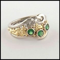 Handmade Celtic Rings Gold Tsavorite Rings In Fine Jewelry Style, 14k Gold Multi-stone Emerald Ring For May Birthstone, Gold Tsavorite Promise Ring, Gold Tsavorite Birthstone Ring, Heirloom Yellow Gold Tsavorite Ring, Heirloom Tsavorite Yellow Gold Ring, Gold Sterling Silver Multi-stone Emerald Ring, Anniversary Tsavorite Ring In Yellow Gold, Gold Tsavorite Ring For May Birthstone