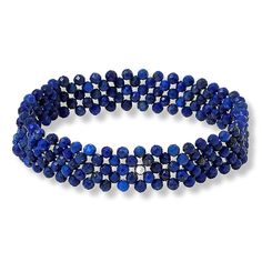 Jay King Faceted Blue Lapis Woven Bead Stretch Bracelet  Tiny, faceted blue lapis beads, handcrafted into a woven design, give this easy-to-wear stretch bracelet a fun, fashionable touch of dimension and color. From Jay King.       Approx. 7-1/4"L x 1/2"W; fits 7" to 7-1/2" wrist     Stamped .925 (quality tag only)     Stretch bracelet has 3mm faceted, round blue lapis beads woven together with jeweler's elastic   Stone Information       All sizes and weights approximate     Stabilized Blue Lapi Adjustable Lapis Lazuli Beaded Bracelet With Faceted Beads, Lapis Lazuli Beaded Bracelets With Polished Round Beads, Elegant Adjustable Lapis Lazuli Beaded Bracelet, Elegant Beaded Bracelets With Lapis Lazuli, Elegant Lapis Lazuli Beaded Bracelets, Beaded Lapis Lazuli Bracelet, Lapis Lazuli Beaded Bracelet, Color Bands, Blue Lapis