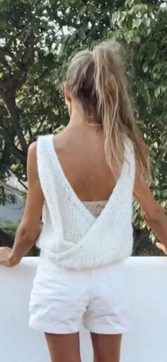 Casual Summer Sweater Vest, Elegant V-neck Summer Sweater, White Sleeveless Knit Top For Vacation, Cozy Stretch Tops For Summer, White Sweater Vest For Summer Vacation, White Sleeveless Sweater Vest For Vacation, Chic Knit Sweater Vest For Vacation, Chic Summer Vacation Sweater, Chic Sleeveless Summer Sweater