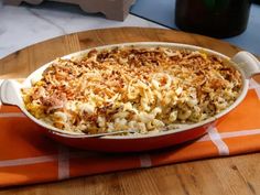 a casserole dish with macaroni and cheese in it on a table