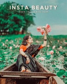 a woman sitting in a boat with flowers on her hand and the words insta beauty above her