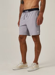 Made for your dynamic and sustainable lifestyle with up-cycled performance fabric. Our Core Active Shorts have a classic athletic fit with a scalloped leg, designed to be the most universal performance item in your wardrobe. Function is never forgotten with mesh-lined pockets while the 7Diamonds signature details elevate your style in everything between warm-up to cool-down. Details Model is 6'1" and wears a size medium. Care: Machine wash cold, tumble dry low Composition: 46% Recycled Polyester Gray Sporty Activewear With Built-in Shorts, Gray Activewear With Elastic Waistband And 4-way Stretch, Gray 4-way Stretch Activewear With Elastic Waistband, Casual Gray Athletic Shorts For Training, Gray Athleisure Activewear With Elastic Waistband, Gray Activewear With Built-in Shorts And Athletic Fit, Gray Athletic Fit Bottoms For Training, Gray Nylon Training Bottoms, Functional Gray Running Bottoms