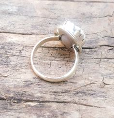 Cowrie Ring, Handmade Ring, White Stone Ring, Engagement Ring, Gifts for her Handmade Ring, Handcrafted Ring, Sterling Silver Ring, Wedding Ring, Boho Ring, Designer Ring, Handmade Jewelry, Cowrie Seashell Ring, Statement Ring, Silver Ring, Wedding Jewelry, Gifts for her, 100% handmade ring with Cowrie 92.5% sterling silver Cowrie shells are known as the most successful and the best form of currency in the various regions of the world. According to the African legends, the cowrie shells are repr Handmade Silver Cluster Ring For Anniversary, Handmade Adjustable Topaz Ring For Anniversary, Silver Open Pearl Ring For Jewelry Making, Bohemian Rings With Bezel Setting, Handmade Silver Topaz Ring, Handmade Silver Topaz Open Ring, Adjustable Opal Ring With Bezel Setting, Silver Opal Ring With Bezel Setting For Promise, Silver Opal Promise Ring With Bezel Setting