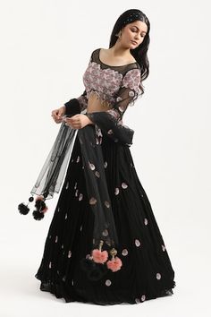 Black lehenga with bead and resham embroidered circle motifs on a pleated base. Comes with a padded sheer yoke blouse highlighted by embroidered floral circle motif pattern and bead tassels. Comes with sheer dupatta. - Aza Fashions Black Sharara With Dori Work For Wedding, Black Lehenga With Sheer Dupatta, Wedding Black Sharara With Dori Work, Black Embroidered Party Wear Lehenga, Designer Black Choli With Dori Work, Black Dori Work Lehenga For Reception, Black Choli With Sheer Dupatta For Reception, Festive Black Dori Work Dress, Elegant Black Sets With Dori Work