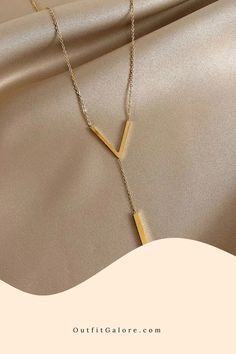 Trendsetting V-Neck Gold Clavicle Necklace Minimalist Dangle Necklaces For Parties, Gold Y-shape Necklace For Formal Occasions, Formal Gold Y-shaped Necklace, Clavicle Chain Pendant Necklace For Party, Party Pendant Necklace With Clavicle Chain, Party Clavicle Chain Pendant Necklace, Minimalist Gold Drop Necklace For Party, Gold Y-shape Clavicle Chain Necklace, Clavicle Chain Y-shape Drop Necklace