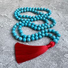 Turquoise Mala Necklace Turquoise Howlite 108 Mala Beads Necklace Hand Knotted Mala Yoga Jewelry Red Tassel Mala Bead Spiritual Necklaces -  8mm  Turquoise Howlite 108 beads -  10 mm Howlite Guru bead -  9cm Red tassel MY SHOP: https://www.etsy.com/shop/BonBonStones Please contact me with any questions. I'm happy to help! Turquoise Beaded Necklaces With 8mm Beads For Healing, Turquoise Beaded Necklace With 8mm Beads For Healing, Turquoise Beaded Necklaces For Meditation, Turquoise Beaded Necklaces With 8mm Beads For Meditation, Turquoise Beaded Necklace For Meditation With 8mm Beads, Spiritual Turquoise Beaded Necklace With 108 Beads, Bohemian Blue Turquoise Necklace With 8mm Beads, Turquoise Beaded Necklaces With 8mm Beads, Turquoise Beaded Necklace With 8mm Beads