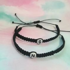 A Perfect matching bracelet! ideal gift to express your love and friendship to that special person in your life. (Black initials bracelet), You can choose different colors in the menus box. Include a (Wish card) Pinky promise bracelet. Bracelet Features: (1) 0.8mm Nylon Cord (2) Acrylic Letter Beads (3) Bracelet is adjustable MIN SIZE 5 INCHES TO 13 INCHES. if you want other size let me know. (4) Cord color options are available. Trendy Friendship Bracelets With Letter Print, Trendy Friendship Bracelets With Letter Print For Gift, Trendy Friendship Bracelets With Letter Print As Gift, Friendship Black Jewelry With Letter Beads, Black Jewelry With Letter Beads For Friendship, Black Friendship Bracelets With Letter Beads, Black Beaded Bracelets With Letter Print As Gift, Black Beaded Bracelet With Letter Print As Gift, Adjustable Friendship Bracelets With Letter Print