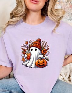 Halloween Ghost Comfort Colors Shirt, Halloween Women's Shirt, Cute Halloween Shirt, Spooky Season T-Shirts, Pumpkin Ghost Shirt  Ordering Instructions 1. **Review Information**    - Carefully read all the provided information before placing your order. 2. **Select Item Type and Size**    - Choose the item type and size from the dropdown menu. 3. **Select Item Color**    - Choose the color of the item using the dropdown menu. 4. **Specify Design Color**    - In the optional message section, spec Purple Crew Neck Top For Halloween, Halloween Cartoon Print Crew Neck Shirt, Halloween Crew Neck Shirt With Cartoon Print, Ghost Shirt, Halloween Women, Halloween Ghosts, Twill Tape, Halloween Shirt, Cute Halloween