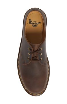 A signature sole grounds this bold derby crafted from hearty leather and fitted with air cushioning for comfort. Style Name:Dr. Martens Plain Toe Derby (Men). Style Number: 452515. Rugged Leather Oxfords With Round Toe, Casual Leather Oxfords Plain Toe, Casual Leather Plain Toe Oxfords, Classic Low-top Oxfords With Leather Footbed, Classic Calf Leather Lace-up Shoes With Leather Footbed, Low-top Leather Workwear Boots, Leather Low-top Workwear Boots, Classic Low-top Boots With Leather Footbed, Classic Low-top Dress Shoes With Leather Footbed