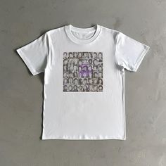 Introducing the must-have addition to any rap fan's wardrobe: the **Lucki Gemini Album Tee Celebrate Lucki's iconic GEMINI! album with this exclusive piece of Lucki merch. Carefully crafted from 100% premium cotton, this shirt offers unparalleled comfort and durability, making it perfect for everyday wear or for showcasing at his next concert. Available in sizes ranging from S to XXL, this versatile tee ensures a perfect fit for fans of all shapes and sizes. The stylish design features bold grap Purple Band Merch T-shirt For Streetwear, Purple Graphic Print Hip Hop Tops, Purple Cotton Hip Hop Tops, Hip Hop Purple Top With Letter Print, Unisex Fan Merchandise Shirt With Screen Print, Purple Hip Hop Top With Letter Print, Purple T-shirt With Front Print For Streetwear, Unisex Screen Print Shirt For Fan Merchandise, Unisex Short Sleeve Shirt For Fan Merchandise