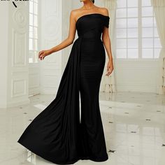 Black Stretchy Fabric Off Shoulder Gown Size Large Never Worn In Original Package Black Stretch Gown For Gala, Black Stretch Gown For Evening, Full Length Black Dress For Banquet, Black Full-length Dress For Banquet, Elegant Black Stretch Gown, Black Stretch Evening Dress For Gala, Black Stretch Gala Evening Dress, Black Stretch Evening Dress For Banquet, Black Maxi Length Gown For Banquet