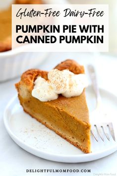 a slice of pumpkin pie with whipped cream on top and the words gluten - free dairy - free pumpkin pie with canned pumpkin