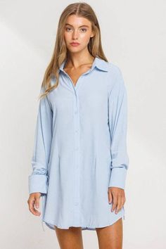 Blue Ruched Sleeve Shirt Dress This versatile shirt dress is a must-have for any fashion-forward individual. Made from high-quality fabric, it is designed to provide both comfort and style. The dress features a beautiful shade of blue, making it perfect for the summer season. Its ruched sleeves add a touch of elegance and sophistication, making it suitable for both casual and business occasions. The dress has a minimal and classic design, making it a timeless piece in any wardrobe. Its shirt-style collar and button-down front add a touch of femininity, while the ruched sleeves add a unique twist to the overall look. The dress falls just above the knee, making it suitable for various body types. Whether you're heading to a brunch with friends or a business meeting, this dress is sure to mak Ruched Sleeve, Dress Shirt Sleeves, Business Meeting, Button Up Dress, Summer Season, Fall Dresses, Above The Knee, Stylish Dresses, Formal Occasion