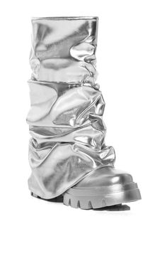 We can’t get enough of our Mate Silver Chunky Boots! These platform metallic boots feature a fold over silhouette with scrunched metallic silver material, a chunky silver sole, and a shiny silver upper. These are perfect for any music festival or for adding a statement shoe to any outfit. PU upper Mid calf-height shaft Rounded toe Flatform sole 12” shaft height 17" calf circumference 2.5” heel height Chunky Flat Boots, Winter Festival Outfit, Fold Over Boots, Silver Boots, Metallic Boots, Azalea Wang, Pink Friday, Sandal Platform, Statement Shoe