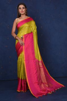 Buy gorgeous pista green Gadhwal silk saree online in USA with pink border and pallu. Set fashion goals on special occasions in exclusive silk sarees, Banarasi sarees, Kanjivaram sarees, handloom sarees, chiffon sarees, designer sarees from Pure Elegance Indian fashion store in USA.-full view Green Pre-draped Saree With Meenakari For Puja, Green Semi-stitched Pre-draped Saree With Meenakari, Green Bollywood Pre-draped Saree With Meenakari, Green Paithani Silk Pre-draped Saree With Self Design, Green Raw Silk Pre-draped Saree With Self Design, Green Tussar Silk Pre-draped Saree With Dupatta, Festive Green Paithani Silk Pre-draped Saree, Green Slub Silk Pre-draped Saree For Diwali, Pista Green Meenakari Chanderi Saree