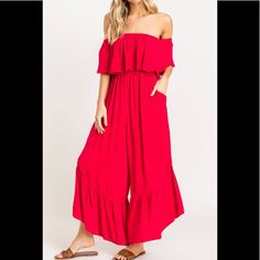 Flattering, Flowy And Fun, What Else Can You Say About About This Gorgeous Red Ruffle Jumpsuit! Featuring Pockets, Off The Shoulder Ruffle Detail, Smocked Waist, And Ruffle Tiered Relax Fit Bottoms. Perfect For Lounging, Brunching, Trips To The Beach, And All Your Favorite Weekend Activities. Fits True To Size Model Is Wearing A Size Small Fabric: 100% Rayon Chic Red Jumpsuit With Ruffles, Chic Red Strapless Jumpsuit For Spring, Red Chic Jumpsuits And Rompers With Ruffles, Casual Red Ruffled Jumpsuits And Rompers, Casual Red Jumpsuits And Rompers With Ruffles, Off The Shoulder Jumpsuit, Tie Dye Sweats, Pleated Jumpsuit, Black And White Romper