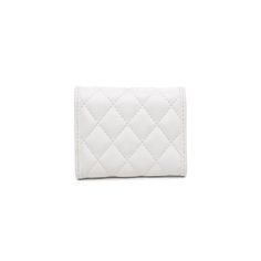 This vegan leather wallet is quilted all over for a chic look, and features silver hardware for a touch of glamour. The turnlock closure keeps your belongings secure, while the interior features a fabric lining, cash compartment, and six card slots. Whether you're carrying it on its own or in your favorite handbag, the Shantel is sure to become a go-to accessory. Material: Vegan Leather Bag Type: Wallet Closure: Turnlock Exterior Details: Quilted all-over, silver hardware Inside Features: Fabric Quilted Wallet, Exterior Details, Favorite Handbags, Vegan Leather Bag, Spring Gifts, Capri Blue, Hats For Sale, Sneaker Heels, Shoes Booties