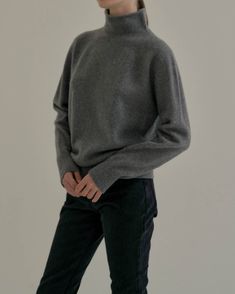 Relaxed, soft 100% wool mock turtleneck. Slouchy, and perfect alone or under blazers and coats. - Rolled mock turtleneck- Ribbed hem, and cuffs - Length 25", Bust 42", Sleeve 31"- 100% wool- Dry clean - Imported High Neck Wool Sweater For Work, Gray Sweater With Ribbed Collar For Work, Classic Solid Turtleneck Outerwear, Classic Turtleneck Outerwear, Solid Cashmere Turtleneck For Workwear, Gray Turtleneck For Fall Layering, Gray Funnel Neck Turtleneck For Fall, Gray Turtleneck For Fall, Classic Solid Funnel Neck Turtleneck