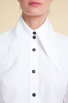 The White Spread Pointed Collar Cotton Blouse for women is a stylish and sophisticated garment that will give any outfit an upgrade. This elegant blouse features a unique collar design that adds a touch of modernity to its overall look. Designed & manufactured in our own studio. Product code: AoS-SHWM20-1-WTCO 98% Cotton, 2% Elastane Relaxed fit with dropped shoulders Spread pointed collar Button-up front Buttoned cuffs Machine wash Merle is 176 cm and is wearing a size S Our sizes are designed Cotton Blouse Design, Classic Blouse, Design Blouse, Blouse Cotton, Classic Blouses, Big Collar, Blouse Long Sleeve, Blouse For Women, Elegant Blouses