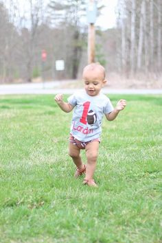 "Football fans? Your little cutie will be styling in this bodysuit or tee! Please see the color & size chart on this listing before placing your order. Colors may appear differently on screens than in person. Most graphics will come in either black or white only. Please select your shirt style from the drop down menu. The image may show a racerback tank, v neck, etc. HOWEVER, the style you select from the drop down menu is the style you will receive. Women's Racerback Tank (runs true to size Short Sleeve Onesie With Name Print For Playtime, Fun Short Sleeve Onesie For Birthday, Pre-shrunk Short Sleeve Onesie For Playtime, Summer Birthday Onesie With Short Sleeves, Graphic Print Short Sleeve Onesie For Birthday, Graphic Print Onesie For First Birthday, Birthday Onesie With Custom Print And Short Sleeves, Birthday Onesie With Custom Print, Family Matching Short Sleeve Onesie For First Birthday