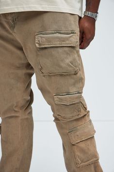 Available In Taupe. 5 Pocket Body Stacked Skinny Flare Fit Zip Fly Button Closure Cargo Square Pockets Open Hem Disclaimer: Due To The Distressing Process, Each Garment Is Unique. Disclaimer: To Keep The Aesthetic Of This Garment, Please Follow The Care Instructions Carefully. 88% Cotton, 8% Polyester, 4% Spandex Imported | Mens Three Cargo Stacked Skinny Flare Jeans in Taupe size 30 by Fashion Nova Distressed Fitted Cargo Jeans, Casual Fitted Washed Cargo Jeans, Fitted Khaki Cargo Jeans, Casual Khaki Cargo Pants With Button Closure, Casual Cotton Cargo Jeans With Button Closure, Fitted Khaki Cargo Jeans Casual, Casual Fitted Khaki Cargo Jeans, Taupe Fashion, Flare Jeans