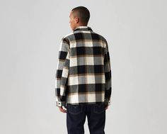 Indulge in timeless style and comfort with our cotton plaid shirt jacket, boasting a quilted interior lining for added warmth and coziness. With its thoughtful design featuring two lower on-seam hand pockets, two snap chest pockets, a center front zip closure with snap placket, and a laydown collar, this jacket is the perfect blend of fashion and functionality. Soft cotton plaid fabric offers a classic and versatile look suitable for various occasions. Quilted interior lining provides extra warmth and insulation, perfect for cooler weather. Two lower on-seam hand pockets offer convenient storage and hand-warming functionality. Two snap chest pockets add a stylish and functional element to the jacket's design. Center front zip closure with snap placket ensures a secure fit and adds a touch Plaid Cotton Outerwear With Buttoned Pockets, Classic Plaid Outerwear With Relaxed Fit, Classic Plaid Shacket With Pockets, Casual Plaid Outerwear With Patch Pockets, Plaid Cotton Outerwear With Patch Pockets, Plaid Shacket, Cotton Plaid Shirt, Plaid Fabric, Design Center