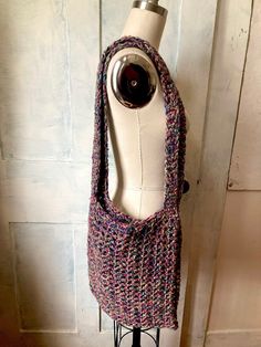 "Handmade crocheted handbag  Can be worn as a crossbody bag Blue fuchsia tan and yellow wool  2 straps  14\" long  12\" wide  Straps 35\" long - 1.25\" wide  Condition - very good vintage" Bohemian Shoulder Bag With Adjustable Strap For Fall, Bohemian Multicolor Bags For Fall, Handmade Fall Shoulder Bag, Bohemian Multicolor Fall Bags, Bohemian Shoulder Bag With Long Strap, Bohemian Shoulder Bag With Long Strap For Everyday Use, Multicolor Yarn Bag For Everyday Use, Bohemian Multicolor Knitted Shoulder Bag, Handmade Crochet Hobo Bag For Everyday Use