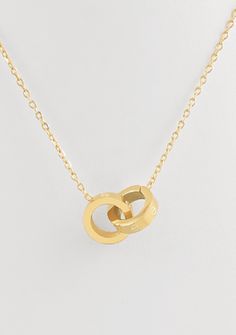 Adorned with an interlocking circle pendant, this necklace adds a touch of sophistication and subtleness to any outfit. It is a must-have dainty necklace with a touch of flair! Brass Gold Dipped Lobster Clasp 16" L Circle Pendant Necklace, Gold Dipped, Brass Gold, Circle Pendant, Dainty Necklace, Instagram Shop, Lobster Clasp, Gift Card, Pendant Necklace